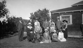 Unidentified group (Bruce family?) next to house