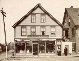 James Porter and Maude Worthington in front of G.E. Corbitt store