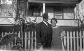 Michael and Helen McDonald standing in yard of 631 Langford Street