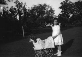 Sheila McBride with doll in carriage