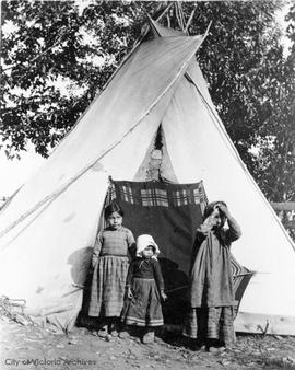 First Nations family outside tent, Fort Vermillion