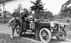 Ladies getting into Mr. Cusack's Daimler