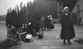 Ethel and Maude Bruce and friends on dock