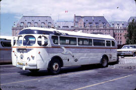 Gray Line tour bus behind the Empress Hotel