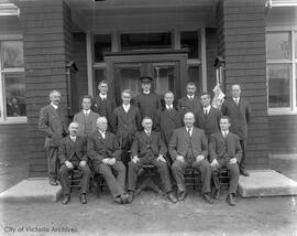 [Saanich Municipal Council and staff?] in front of Saanich Municipal Hall, 4512 West Saanich Road