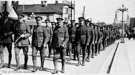 Troops marching along Quadra Street