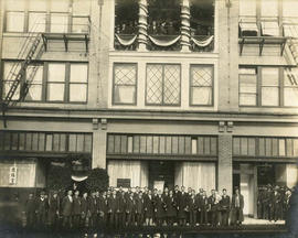 Group outside Hook Sin Tong Building, 658-666 Herald Street