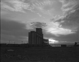 Grain elevator at sunset