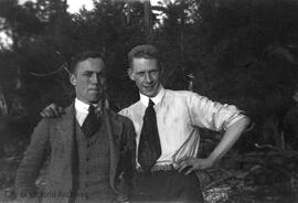 Two unidentified men at the beach