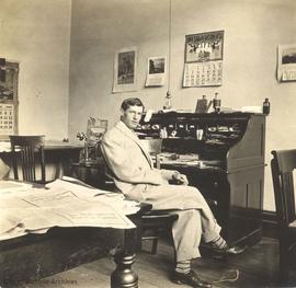 William D'Oyly Rochfort in his office in the Five Sisters Block