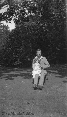 Frank Rattenbury holding doll