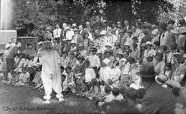 Group watching a clown