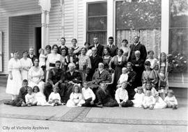 Mr. and Mrs. David Spencer and their daughters. L to R: (back) Charlotte, Florence (Floss), Ada, Sara, Agnes, Ann, Josephine. (front) David Spencer, Emma Spencer, Mary.