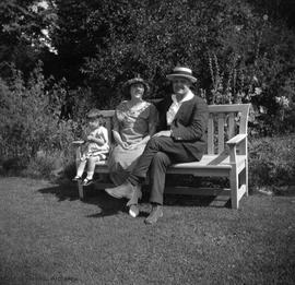 Helen and Michael McDonald with daughter on bench