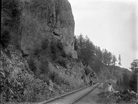 Man on a hand operated rail car