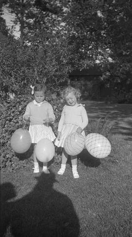 [Susan Burton?] and friend (?) with balloons