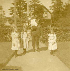 Dr. James D. Helmcken with the Vincent family at 35 Erie Street