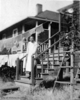 Chinese man named Toye on steps